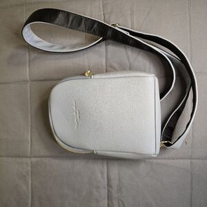 Sky blue inicat crossbody bag with gold zippers NWOT